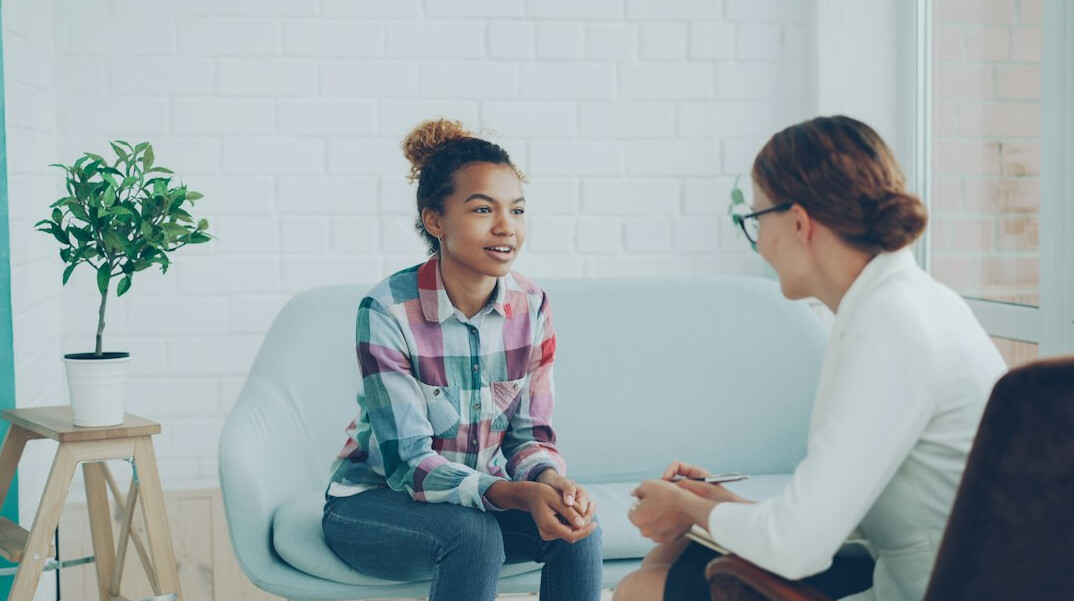 person talking to therapist