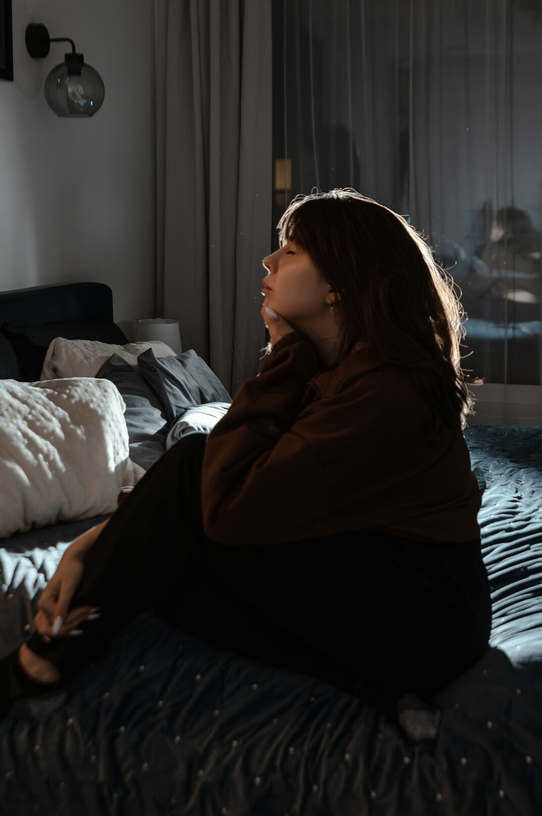 person meditating in quiet room
