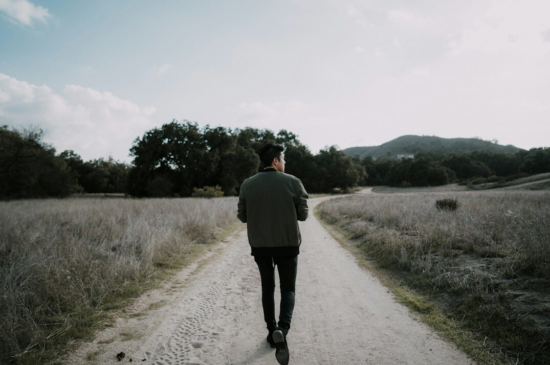 person walking in park